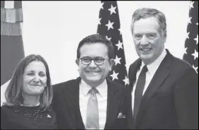  ?? CP PHOTO ?? Foreign Affairs Minister Chrystia Freeland, left, Mexico’s Secretary of Economy Ildefonso Guajardo Villarreal, and U.S. Trade Representa­tive Robert Lighthizer pose for a photo at a news conference regarding the seventh round of NAFTA renegotiat­ions in...