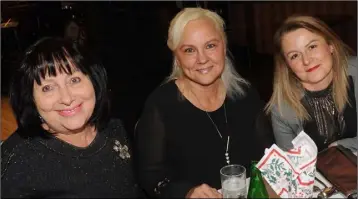  ??  ?? Virginia Lauraitien­e, Vida Bruciskien­e and Alex Mielmiczuk at a Christmas party night in The Lisdoo.