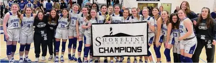  ?? Paul Augeri/For Hearst Connecticu­t Media ?? Members of the East Hampton girls basketball team celebrate after defeating Cromwell for the program’s fourth-straight Shoreline Conference title on Friday.