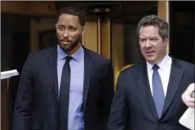  ?? THE ASSOCIATED PRESS ?? Former assistant basketball coach for the University of Southern California Tony
Bland, left, and his attorney Jeffrey Lichtman, leave federal court in New York, in this Wednesday, June 5, 2019, file photo. The NCAA hit Southern California’s men’s basketball program with two years’ probation and a $5,000 fine as the result of a former assistant who violated NCAA ethical conduct rules when he accepted a bribe to steer players to a business management company.