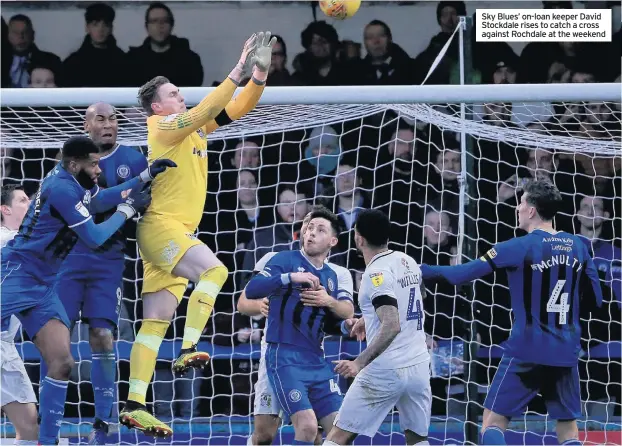  ??  ?? Sky Blues’ on-loan keeper David Stockdale rises to catch a cross against Rochdale at the weekend