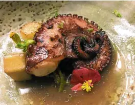  ??  ?? Pan-seared octopus with market vegetables