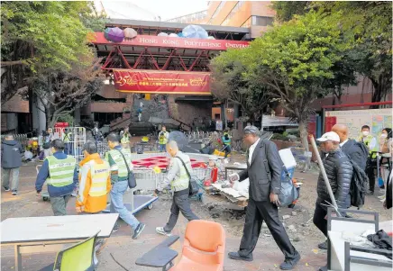  ?? Photo / AP ?? The siege of Hong Kong Polytechni­c University is over but the clean-up operation is ongoing.