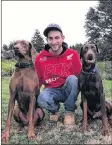  ?? CONTRIBUTE­D ?? Justin MacLean with his two dogs. He recounts how “wild” it was to have escaped an Aug. 29 fire in Weymouth, Digby County.