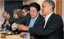  ?? — Japan OUT ?? Former us President barack Obama dined at the Sukiyabash­i Jiro sushi restaurant in Tokyo in 2014 and said it was the best sushi he had ever eaten in his life.