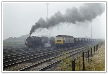  ??  ?? he third photograph, taken in   cto  er         , shows   unslet   Respite   fitted with   iesl e  ector  that  s chimney to those of you not familiar with steam language     ringing loaded       s into     ram     change   idings alongside an unidentifi­ed   lass on an empty rake of the same type of wagons.   he heaps which can   e seen in the   ackground of this shot are of opencast coal from a near  y working, the two tall towers carry lights.  he ne  t two photograph­s were taken later the same week. had arrived with a rake of empty tonners which it had shunted into a holding siding.     wyneth   arrived alongside with eight fully laden       s, the ma  imum allowed up the   ank with a single     usterity  , then returned to the colliery for more.