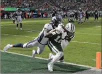  ?? BILL KOSTROUN - THE ASSOCIATED PRESS ?? New York Jets wide receiver Terrelle Pryor (16) catches a pass in front of Denver Broncos’ Isaac Yiadom (41) for a touchdown as during the second half of an NFL football game Sunday, Oct. 7, 2018, in East Rutherford, N.J.