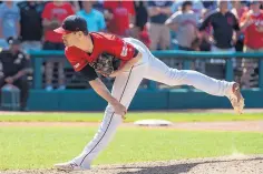  ?? PHIL LONG/ASSOCIATED PRESS ?? Cleveland Indians starting pitcher Shane Bieber strikes out Los Angeles’ Shohei Ohtani during the ninth inning Sunday in Cleveland. The Indians won the game, 6-2, over the Angels.