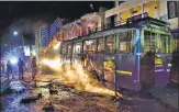  ?? PTI ?? ■
Protesters vandalised a bus during clashes in Bengaluru.