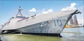  ?? Brett Coomer Houston Chronicle ?? THE COMBAT SHIP, pictured in Galveston, Texas, before the ceremony, is the 13th Navy ship named for a living person since 1850. It will be based in San Diego.