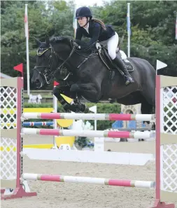  ??  ?? Polly Gredley wins the opening day’s 1.30m class on Unex Arantos