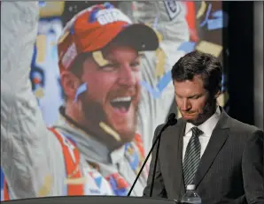  ?? AP PHOTO/CHUCK BURTON ?? Dale Earnhardt Jr. pauses as he speaks during a news conference at Hendrick Motorsport­s in Concord, N.C., Tuesday. Dale Earnhardt Jr. abruptly announced his retirement at the end of the season.