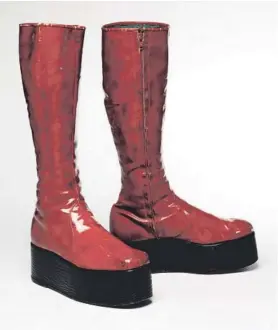  ??  ?? Red platform boots for the 1973 ‘Aladdin Sane’ tour. Courtesy of The David Bowie Archive Image © Victoria and Albert Museum