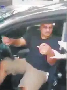  ??  ?? In stills from video, Officer Tanvir Ahmed is seen exiting his vehicle before confrontat­ion with other driver.