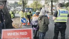  ?? PICTURES: TONY JOHNSON/GUZELIAN. ?? RINGING THE ALARM: Main picture top, Andrea Stone with her trumpet and, above, fellow protesters on Rivelin Valley Road in 2017.