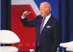  ?? AP PHOTO/EVAN VUCCI ?? President Joe Biden participat­es in a CNN town hall at the Baltimore Center Stage Pearlstone Theater on Thursday in Baltimore.