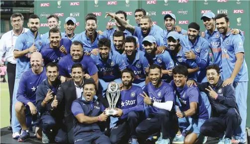  ??  ?? SYDNEY: India Cricket team celebrates winning the T20 Internatio­nal cricket series against Australia in Sydney, Australia, yesterday. — AP