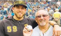  ??  ?? When Joe Musgrove was with Pittsburgh, he and his father, Mark, would talk about the Pirates and Padres.