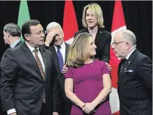  ?? SEAN KILPATRICK THE CANADIAN PRESS ?? U.S. Ambassador to Canada Kelly Craft, holding Foreign Affairs Minister Chrystia Freeland, made her first comment on the arrests of ex-diplomat Michael Kovrig and entreprene­ur Michael Spavor on the weekend.