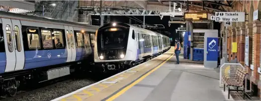  ?? KIM FULLBROOK. ?? TfL Rail 345012 (right) enters Taplow on January 10 with the 1904 Reading-London Paddington, passing 345057 (left) forming the 1844 Paddington-Reading. Crossrail will open in summer 2021. Trains from Reading-Shenfield should have started in December last year.