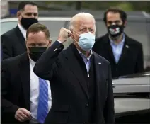  ?? CAROLYN KASTER — THE ASSOCIATED PRESS ?? Democratic presidenti­al candidate former Vice President Joe Biden visits with residents across the street from the Joseph R. Biden Jr. Aquatic Center in Wilmington, Del., Tuesday.