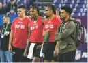  ?? DARRON CUMMINGS THE ASSOCIATED PRESS ?? Alabama’s Bryce Young, right, watches combine drills Saturday with fellow quarterbac­ks, from left, Aidan O’Connell of Purdue, Anthony Richardson of Florida and CJ Stroud of Ohio State.