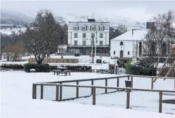  ??  ?? Freezing A snow capped hillside above the village