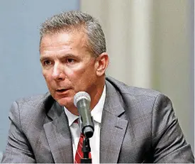  ?? [AP PHOTO] ?? Ohio State coach Urban Meyer has been suspended three games for mishandlin­g an abuse case. Meyer can’t return to the sideline until Sept. 22, when the Buckeyes host Tulane.