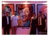  ??  ?? Senate Committee Head on Energy, Senator Win Gatchalian (2nd from left) with the portrait painting of his father, Mr. William Gatchalian.