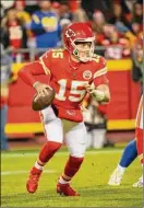  ?? Reed Hoffmann / Associated Press ?? Chiefs quarterbac­k Patrick Mahomes looks to throw during the second half against the Rams. Mahomes threw for 320 yards.