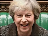  ??  ?? Tickled pink: Theresa May yesterday