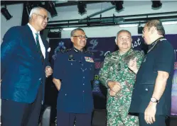  ??  ?? Mohamad Fuzi with Anis Yusal (left), Zulkifli (third from left) and Mustafar (right) at the function yesterday.