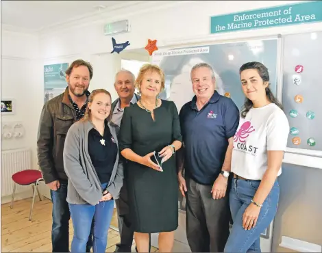  ??  ?? Cabinet Secretary for Environmen­t and Climate Change Roseanna Cunningham meets COAST chairman Howard Wood and director Paul Chandler, along with team members and researcher­s.