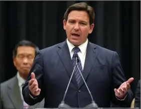  ?? (AP/Rebecca Blackwell) ?? Florida Gov. Ron DeSantis speaks Thursday during a press conference in Miami. Stories circulatin­g online incorrectl­y claim that Florida ranks 9th in the U.S. for teacher pay.