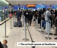  ??  ?? > The arrivals queue at Heathrow