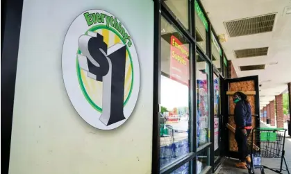  ?? ?? A person enters a Dollar Tree store in Washington in June 2021. Photograph: Erin Scott/Reuters