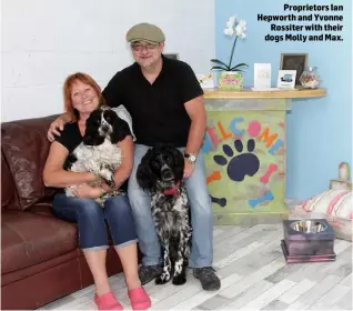  ??  ?? Proprietor­s Ian Hepworth and Yvonne Rossiter with their dogs Molly and Max.