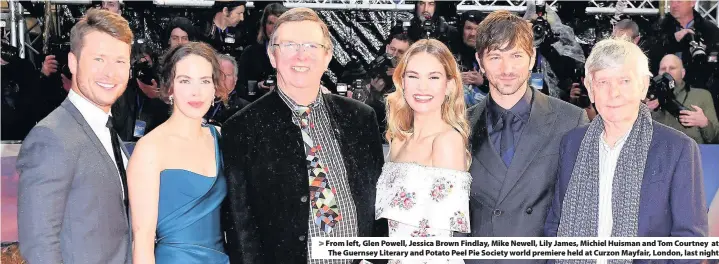  ??  ?? > From left, Glen Powell, Jessica Brown Findlay, Mike Newell, Lily James, Michiel Huisman and Tom Courtney at The Guernsey Literary and Potato Peel Pie Society world premiere held at Curzon Mayfair, London, last night