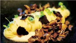  ??  ?? Truffle capellini with wild mushroom and celery root puree