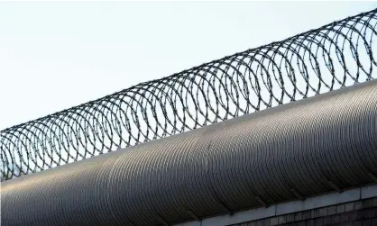  ?? Photograph: Joe Castro/AAP ?? ‘In Australia, prisons are already operating at more than 100% capacity and coronaviru­s rates are increasing exponentia­lly.’
