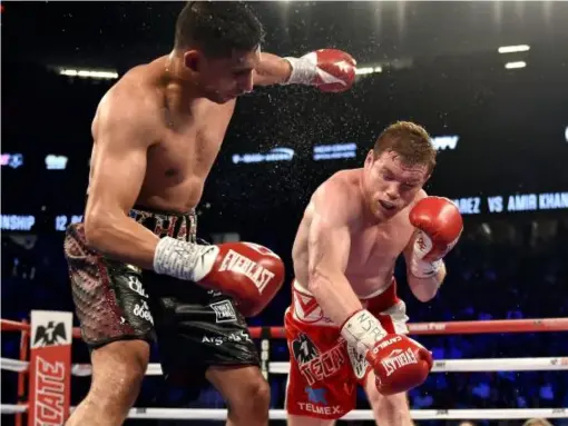  ??  ?? Khan was brutally knocked out by Saul 'Canelo' Alvarez last May (Getty)