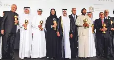  ?? Arshad Ali/Gulf News ?? Shaikh Nahayan Mabarak Al Nahayan with the winners of ABLF Asian Business leader ship Awards 2018, at Armani Hotel Dubai.