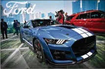  ?? DANIEL ACKER / BLOOMBERG ?? The Ford Mustang Shelby GT500 debuted Monday at the 2019 North American Internatio­nal Auto Show in Detroit with a supercharg­ed 5.2-liter V8 and more than 700 horsepower.