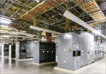  ?? GOOGLE VIA THE NEW YORK TIMES ?? A Google data centre in Oklahoma. Intel has long dominated the business for central processing chips that control the servers in such centres. As the competitio­n to provide central processing chips intensifie­s, Intel is relying on a combinatio­n of...