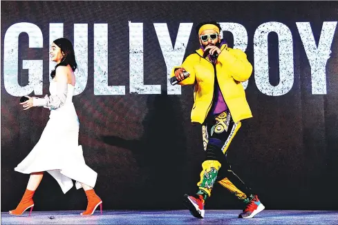  ?? AFP ?? Indian Bollywood actors Ranveer Singh (right) and Alia Bhatt (left) attend the trailer launch of their upcoming musical Hindi film