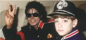  ??  ?? Michael Jackson and 10-year-old James Safechuck in 1988.