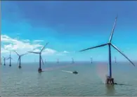  ?? YAO FENG / FOR CHINA DAILY ?? An offshore wind farm is seen in Zhoushan, Zhejiang province.