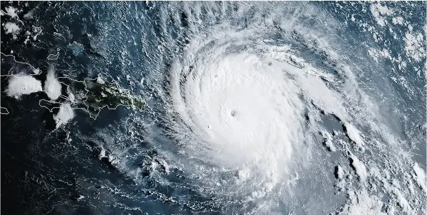  ?? NATIONAL OCEANIC AND ATMOSPHERI­C ADMINISTRA­TION HANDOUT / AGENCE FRANCE- PRESSE / GETTY IMAGES ?? A satellite image of Hurricane Irma mid- day on Wednesday as it slammed into the French Caribbean islands after making landfall in Barbuda.