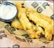  ?? Michael Henninger/Post-Gazette ?? Fried pickles from BRGR at Picklesbur­gh in 2016.