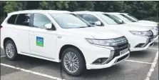  ??  ?? The council recently took delivery of hybrid fuel vehicles.